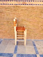 Moroccan Leather Bar Stool handcrafted from solid wood with a genuine leather seat