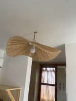 Sculptural raffia pendant light with handmade folded petal shade