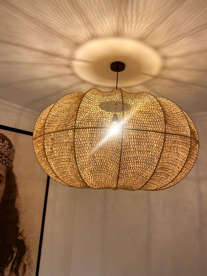Handmade wavy raffia pendant light with ribbed pumpkin shape