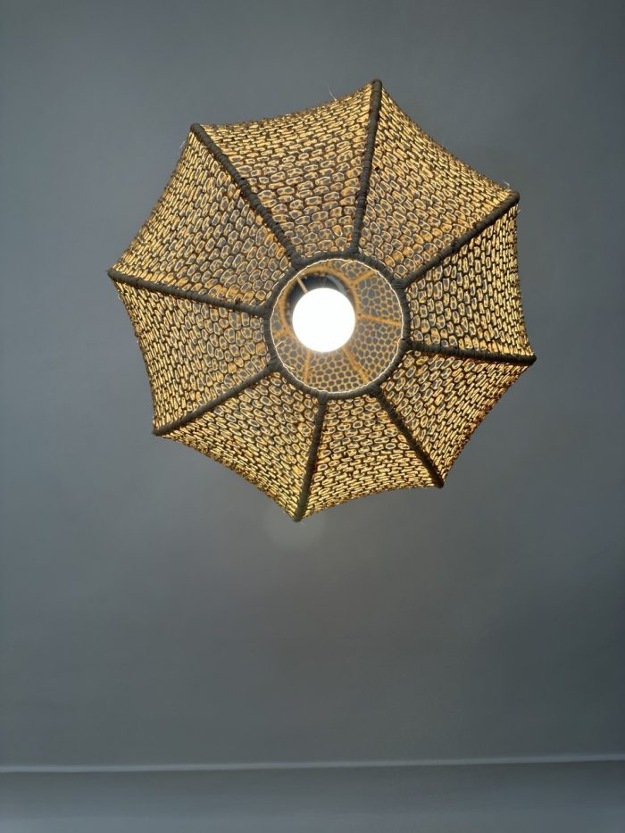 Round raffia pendant light handmade in Morocco with woven globe shape