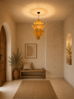 Handmade tiered raffia pendant light with layered sculptural design