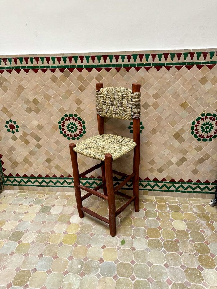 Handwoven Palm Leaf Bar Stool handcrafted from solid wood with a natural woven palm leaf seat