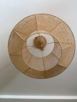 Handmade raffia pendant light with wide flared woven shape