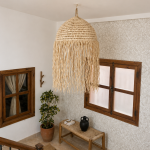 Moroccan straw ball pendant light with long natural raffia fringe