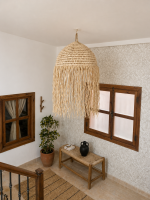 Moroccan straw ball pendant light with long natural raffia fringe