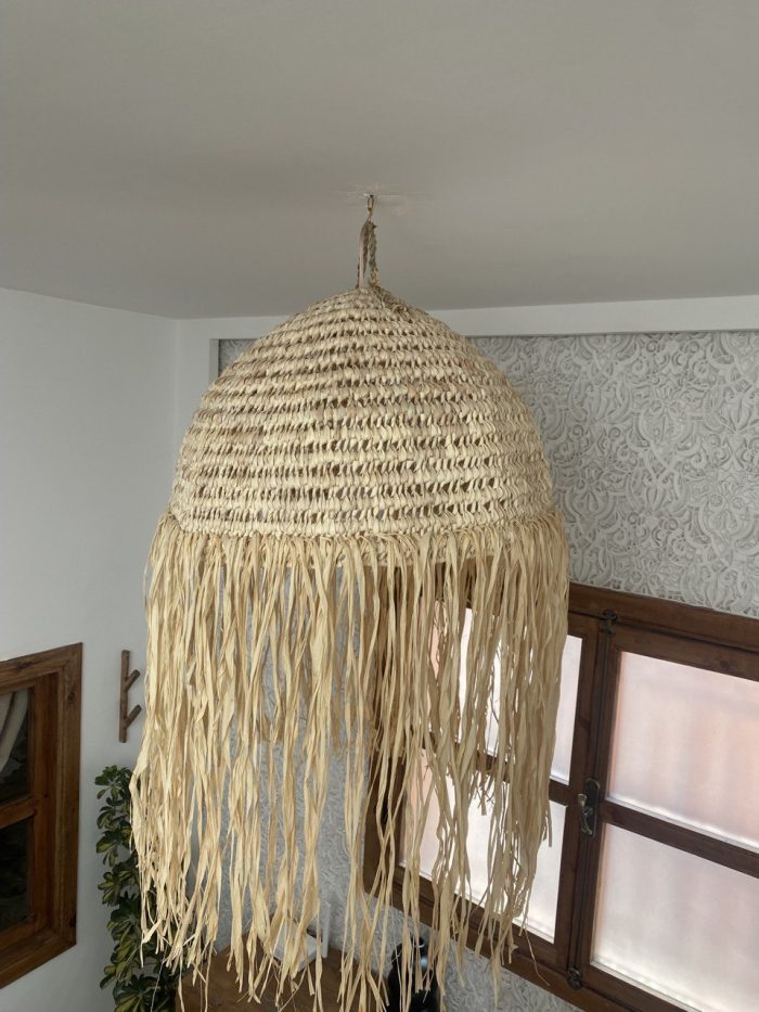 Moroccan straw ball pendant light with long natural raffia fringe