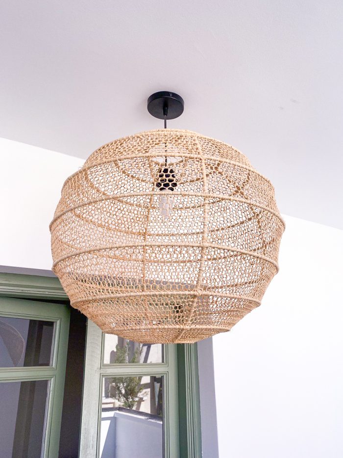 Handmade round raffia pendant light with woven globe basket shape