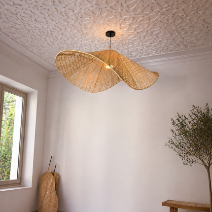 Handmade wavy raffia pendant light with sculptural woven dome shape