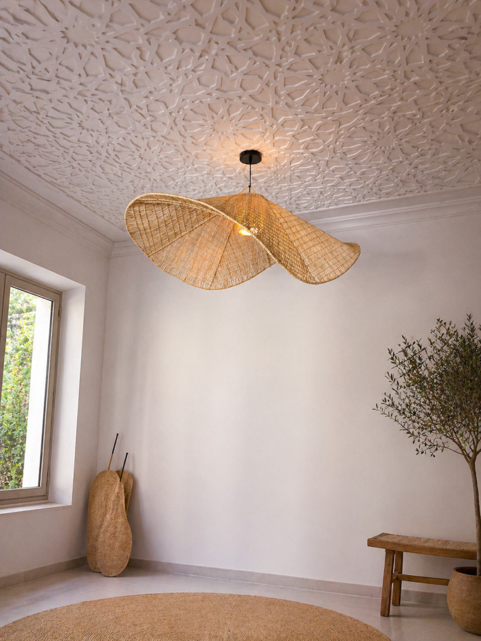 Handmade wavy raffia pendant light with sculptural woven dome shape