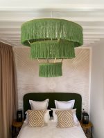 Green fringe chandelier with three tier cascading design