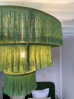Green fringe chandelier with three tier cascading design