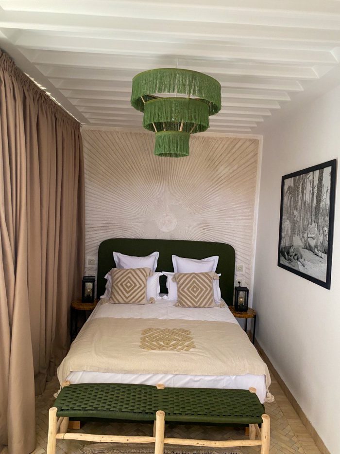 Green fringe chandelier with three tier cascading design