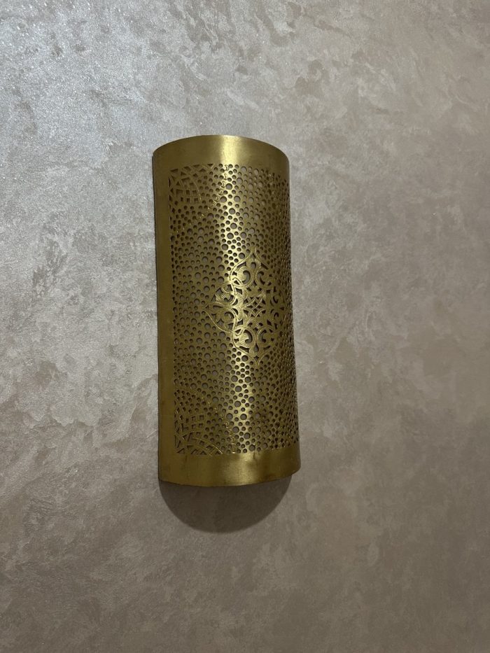 Handmade diamond medallion brass wall sconce with intricate perforated pattern and warm decorative up-and-down lighting.