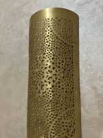 Handmade diamond medallion brass wall sconce with intricate perforated pattern and warm decorative up-and-down lighting.