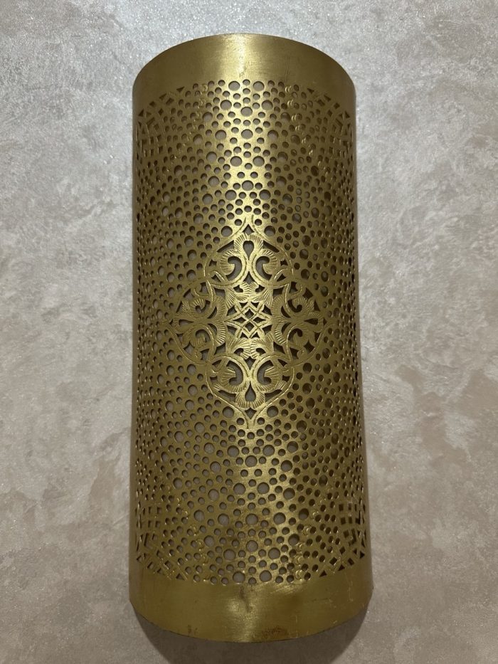 Handmade diamond medallion brass wall sconce with intricate perforated pattern and warm decorative up-and-down lighting.