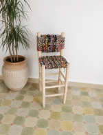 Boucherouite Bar Stool handcrafted from solid wood with a colorful handwoven Boucherouite seat