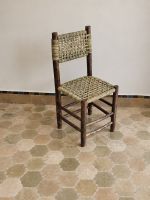 Palm Leaf Wooden Chair handcrafted from solid wood with a natural handwoven palm leaf seat