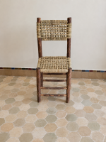 Palm Leaf Wooden Chair handcrafted from solid wood with a natural handwoven palm leaf seat