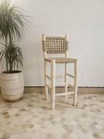 Handcrafted Palm Leaf Bar Stool made from solid wood with a natural handwoven palm leaf seat