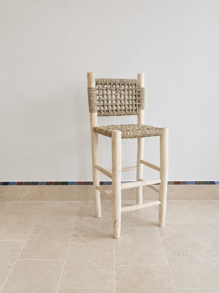 Handcrafted Palm Leaf Bar Stool made from solid wood with a natural handwoven palm leaf seat