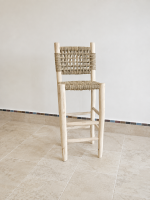 Handcrafted Palm Leaf Bar Stool made from solid wood with a natural handwoven palm leaf seat