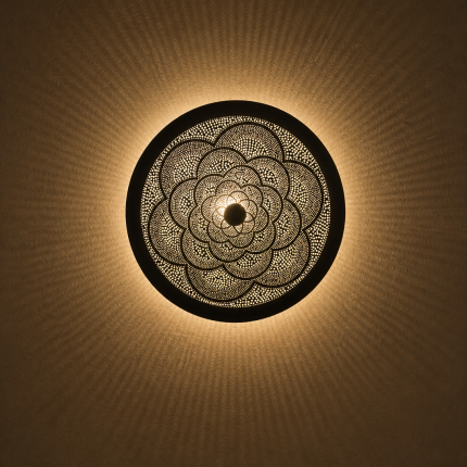 Moroccan Brass Flower Wall Light with handmade pierced rosette pattern and warm decorative glow