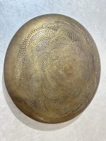 Moroccan Brass Flower Wall Light with handmade pierced rosette pattern and warm decorative glow