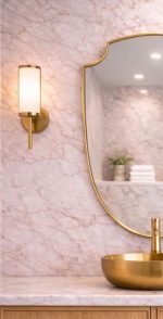 Curved Shield Brass Mirror displayed above entryway console with slim brass frame