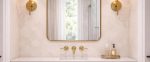 Handmade brass bathroom mirror with cloud arch top and slim brass frame