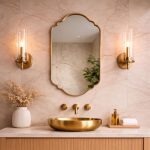 Scalloped Arch Brass Mirror above brass vessel sink and green tiled bathroom wall