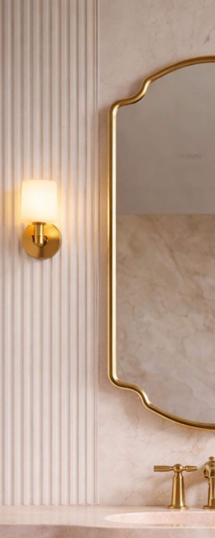 Crown Curve Brass Mirror above wood vanity with green tiled bathroom wall