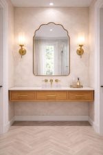 Handmade brass bathroom mirror with cloud arch top and slim brass frame