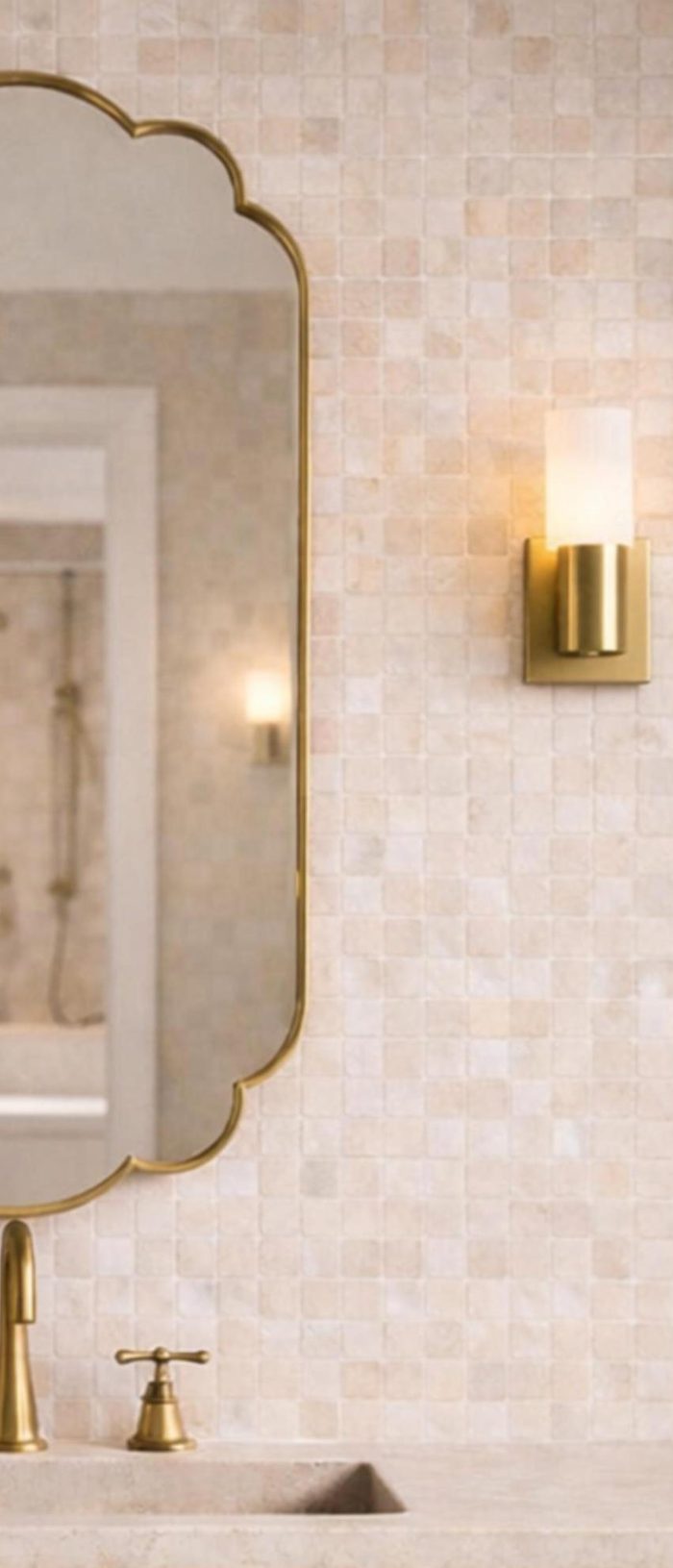 Handmade Moroccan Scalloped Brass Mirror with decorative floral shape above bathroom vanity
