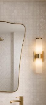 Curved Rectangle Brass Mirror with handcrafted slim brass frame in a modern bathroom vanity setting