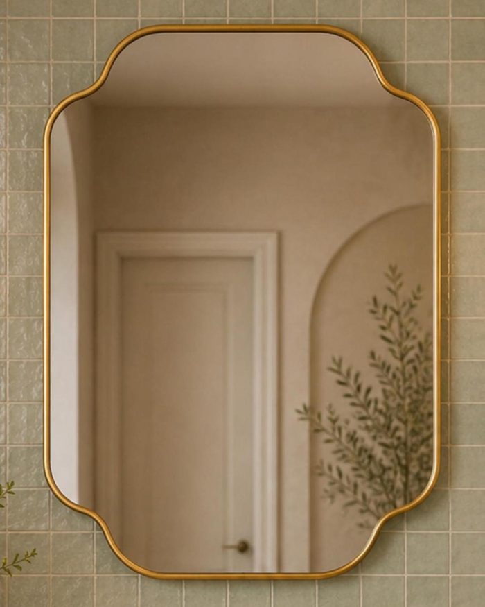 Stepped Corner Brass Mirror with slim brass frame above wooden bathroom vanity