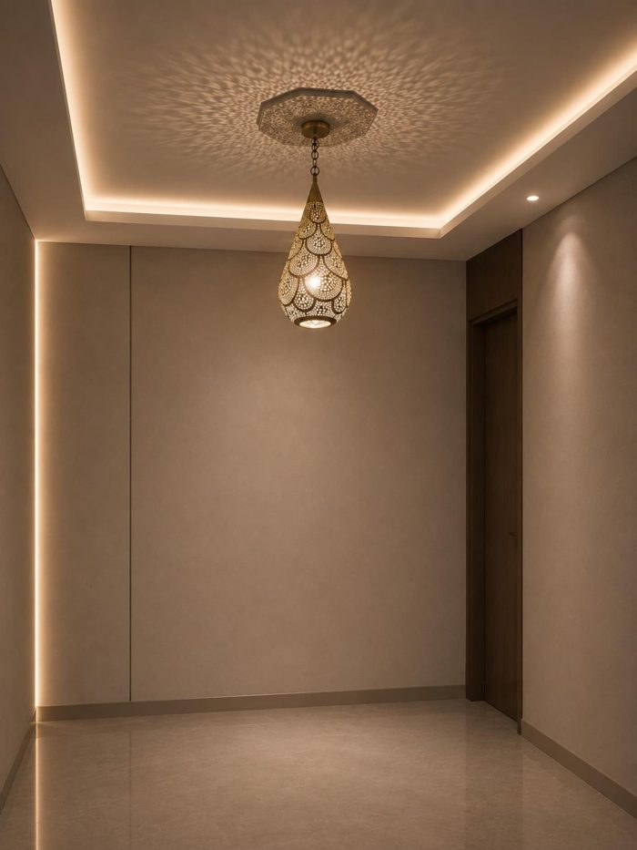 Teardrop Moroccan Brass Pendant Light handmade pierced brass hanging lamp casting decorative ceiling shadows