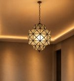 Geometric Glass Pendant Light with faceted glass panels and handcrafted metal frame